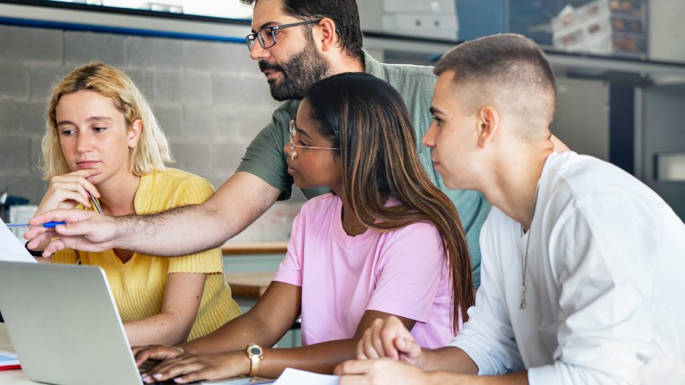 Teacher motivating students to engage with AI tools